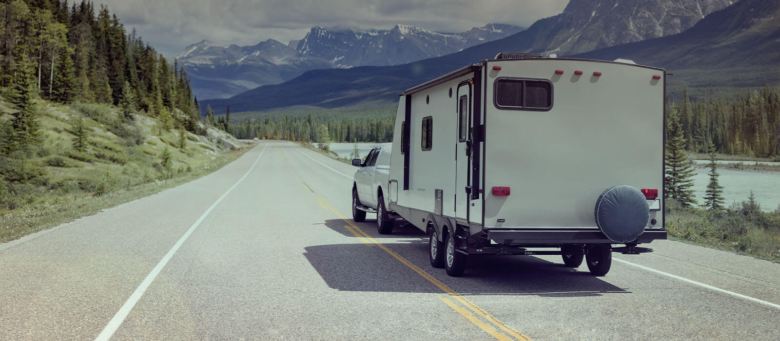 Eldorado RV & Marine Camper on Highway near Mountains